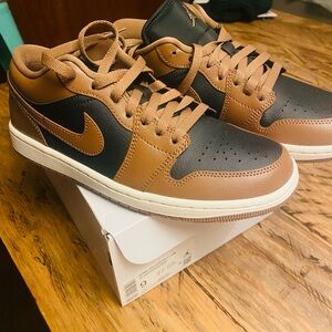 Nike women’s Air Force 1 Black and Tan Sneakers